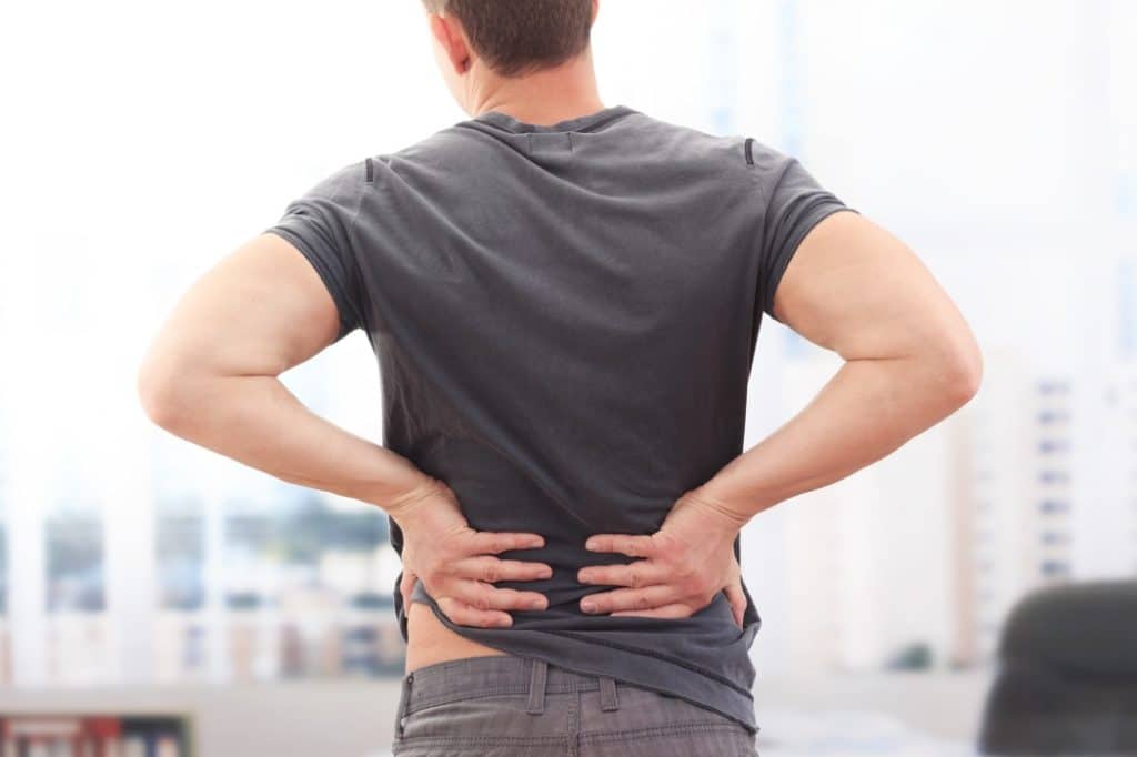 A man has back pain